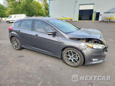 Czwarte zdjęcie samochodu z boku: 2017 FORD FOCUS SEL VIN:1FADP3M2XHL232082 - miniatura