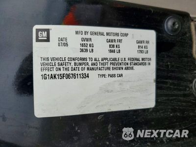 Zdjęcie 12 z 12 samochodu: 2006 CHEVROLET COBALT LS VIN:1G1AK15F067611334 - miniatura