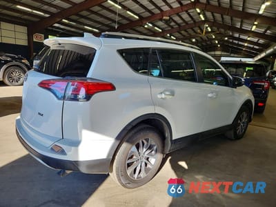 Trzecie zdjęcie samochodu z tyłu: 2018 TOYOTA RAV4 HYBRID XLE VIN:JTMRJREV2JD157505 - miniatura