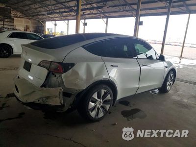 Trzecie zdjęcie samochodu z tyłu: 2021 TESLA MODEL Y VIN:5YJYGDEEXMF098648 - miniatura