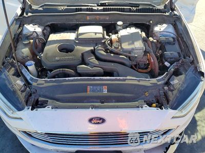Zdjęcie 11 z 12 samochodu: 2017 FORD FUSION SE HYBRID VIN:3FA6P0LU4HR399615 - miniatura