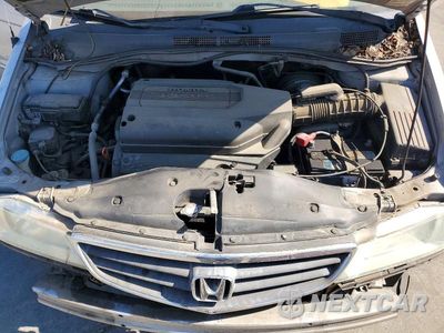 Zdjęcie 12 z 14 samochodu: 2004 HONDA ODYSSEY EX VIN:5FNRL18624B058678 - miniatura
