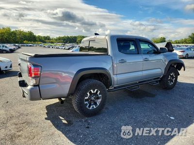 Trzecie zdjęcie samochodu z tyłu: 2021 TOYOTA TACOMA TRD OFF-ROAD VIN:3TYCZ5AN2MT043644 - miniatura