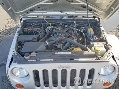 Zdjęcie 11 z 12 samochodu: 2007 JEEP WRANGLER X VIN:1J4GA39187L193669 - miniatura