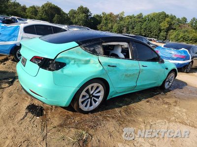 Trzecie zdjęcie samochodu z tyłu: 2022 TESLA MODEL 3 VIN:5YJ3E1EA4NF340217 - miniatura