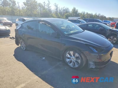 Czwarte zdjęcie samochodu z boku: 2023 TESLA MODEL Y VIN:7SAYGDEE7PA178753 - miniatura