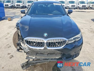 Piąte zdjęcie samochodu w środku: 2020 BMW 330I VIN:3MW5R1J01L8B22003 - miniatura