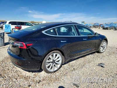Trzecie zdjęcie samochodu z tyłu: 2018 TESLA MODEL 3 VIN:5YJ3E1EA7JF023669 - miniatura
