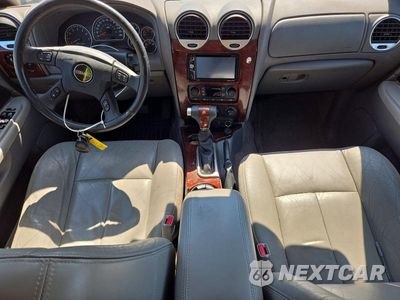 Zdjęcie 8 z 12 samochodu: 2005 GMC ENVOY VIN:1GKDS13S352382975 - miniatura