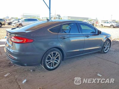 Trzecie zdjęcie samochodu z tyłu: 2019 FORD FUSION TITANIUM VIN:3FA6P0RU5KR182072 - miniatura