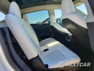 Zdjęcie 11 z 14 samochodu: 2024 TESLA MODEL Y VIN:7SAYGAEE6RF152794 - miniatura