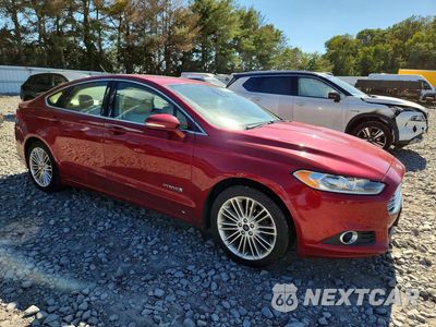 Czwarte zdjęcie samochodu z boku: 2014 FORD FUSION SE HYBRID VIN:3FA6P0LU9ER326476 - miniatura