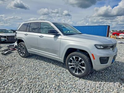 Czwarte zdjęcie samochodu z boku: 2022 JEEP GRAND CHEROKEE OVERLAND 4XE VIN:1C4RJYD65N8761598 - miniatura