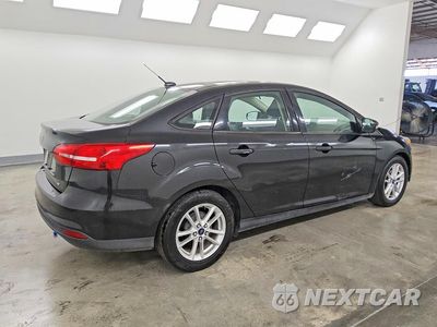 Trzecie zdjęcie samochodu z tyłu: 2015 FORD FOCUS SE VIN:1FADP3F20FL206116 - miniatura