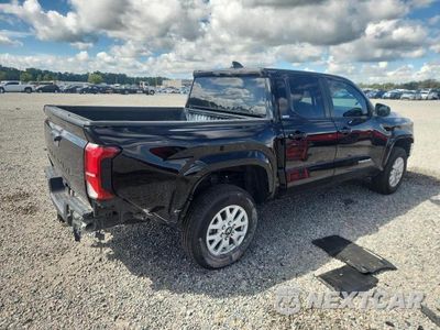 Trzecie zdjęcie samochodu z tyłu: 2024 TOYOTA TACOMA SR5 VIN:3TMKB5FN8RM016640 - miniatura