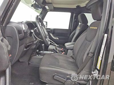 Zdjęcie 7 z 13 samochodu: 2013 JEEP WRANGLER UNLIMITED SAHARA VIN:1C4BJWEG7DL655792 - miniatura