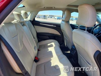 Zdjęcie 10 z 12 samochodu: 2016 FORD FUSION TITANIUM PHEV VIN:3FA6P0SU2GR315047 - miniatura