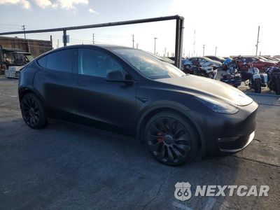 Czwarte zdjęcie samochodu z boku: 2022 TESLA MODEL Y VIN:7SAYGDEF9NF328547 - miniatura