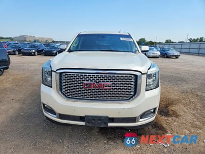 Zdjęcie 6 z 14 samochodu: 2015 GMC YUKON XL DENALI VIN:1GKS2JKJ8FR663131 - miniatura