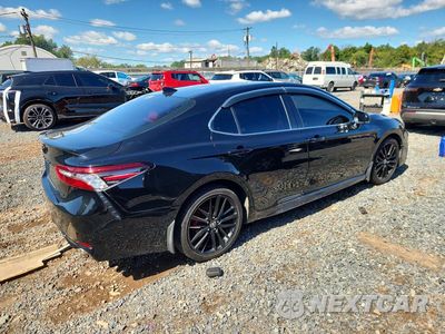 Trzecie zdjęcie samochodu z tyłu: 2022 TOYOTA CAMRY XSE VIN:4T1K61BK5NU054997 - miniatura