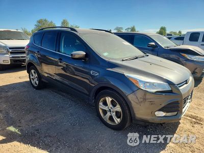 Czwarte zdjęcie samochodu z boku: 2016 FORD ESCAPE SE VIN:1FMCU0GX9GUC74879 - miniatura