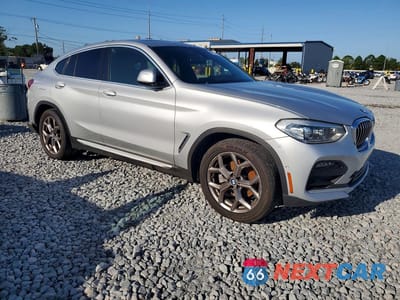 Czwarte zdjęcie samochodu z boku: 2021 BMW X4 XDRIVE30I VIN:5UX2V1C08M9G95990 - miniatura