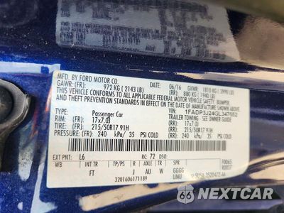 Zdjęcie 12 z 12 samochodu: 2016 FORD FOCUS TITANIUM VIN:1FADP3J24GL347652 - miniatura