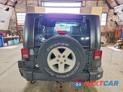Zdjęcie 6 z 13 samochodu: 2010 JEEP WRANGLER SPORT VIN:1J4AA2D16AL202478 - miniatura