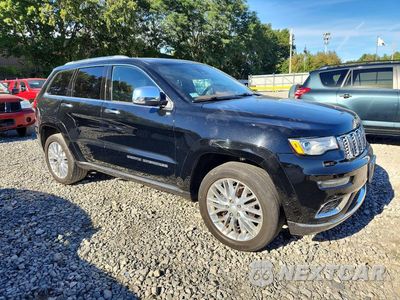 Czwarte zdjęcie samochodu z boku: 2018 JEEP GRAND CHEROKEE SUMMIT VIN:1C4RJFJG8JC479268 - miniatura