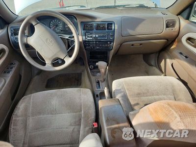 Zdjęcie 8 z 12 samochodu: 1997 TOYOTA COROLLA DX VIN:1NXBB02E1VZ509117 - miniatura