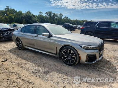 Czwarte zdjęcie samochodu z boku: 2021 BMW 740 XI VIN:WBA7T4C0XMCE50090 - miniatura