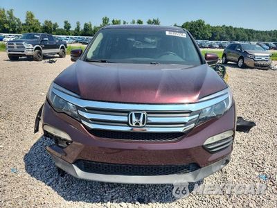 Piąte zdjęcie samochodu w środku: 2017 HONDA PILOT EXL VIN:5FNYF5H56HB002220 - miniatura