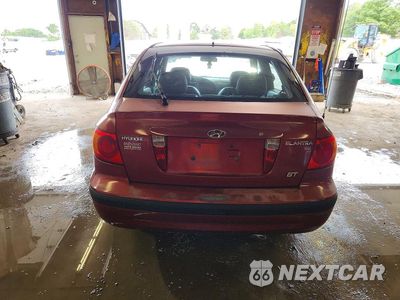 Zdjęcie 6 z 12 samochodu: 2002 HYUNDAI ELANTRA GT VIN:KMHDN55D62U058973 - miniatura
