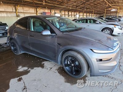 Czwarte zdjęcie samochodu z boku: TESLA Y VIN:7SAYGDED0TF379883 - miniatura