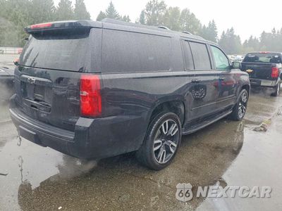 Trzecie zdjęcie samochodu z tyłu: 2019 CHEVROLET SUBURBAN K1500 PREMIER VIN:1GNSKJKJ9KR184844 - miniatura