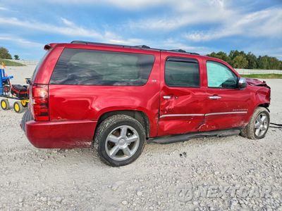 Trzecie zdjęcie samochodu z tyłu: 2013 CHEVROLET SUBURBAN K1500 LTZ VIN:1GNSKKE73DR152996 - miniatura