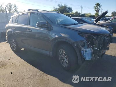 Czwarte zdjęcie samochodu z boku: 2017 TOYOTA RAV4 HYBRID XLE VIN:JTMRJREVXHD069957 - miniatura
