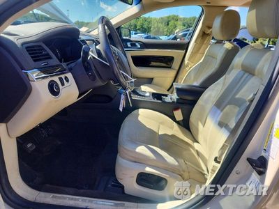 Zdjęcie 7 z 13 samochodu: 2014 LINCOLN MKS VIN:1LNHL9FT8EG600615 - miniatura