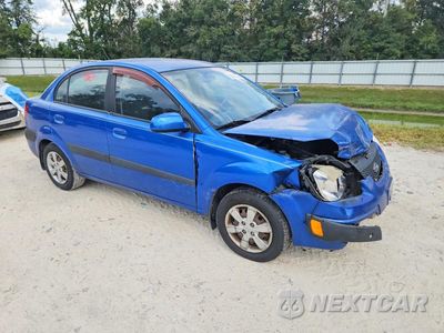Czwarte zdjęcie samochodu z boku: 2009 KIA RIO BASE VIN:KNADE223496531635 - miniatura