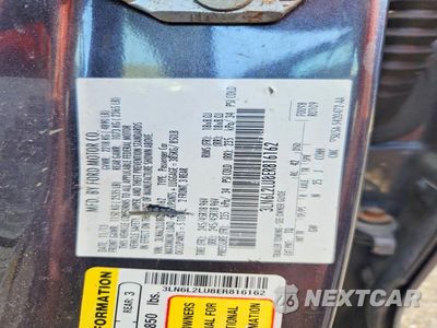 Zdjęcie 12 z 12 samochodu: 2014 LINCOLN MKZ HYBRID VIN:3LN6L2LU8ER816162 - miniatura