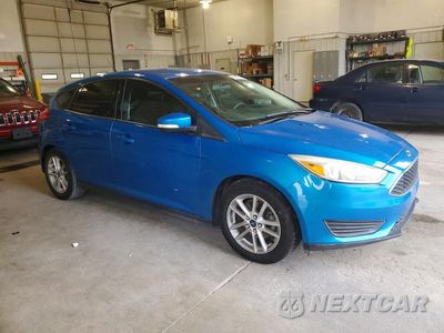 Czwarte zdjęcie samochodu z boku: 2016 FORD FOCUS SE VIN:1FADP3K2XGL336816 - miniatura