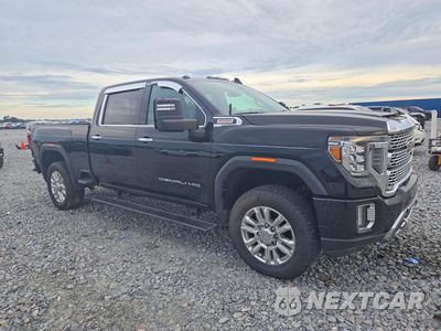Czwarte zdjęcie samochodu z boku: 2021 GMC SIERRA K2500 DENALI VIN:1GT49REY3MF275729 - miniatura
