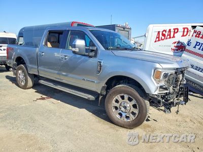 Czwarte zdjęcie samochodu z boku: 2022 FORD F350 SUPER DUTY VIN:1FT8W3BT2NEC65961 - miniatura
