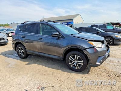 Czwarte zdjęcie samochodu z boku: 2017 TOYOTA RAV4 LE VIN:JTMZFREV6HJ105923 - miniatura