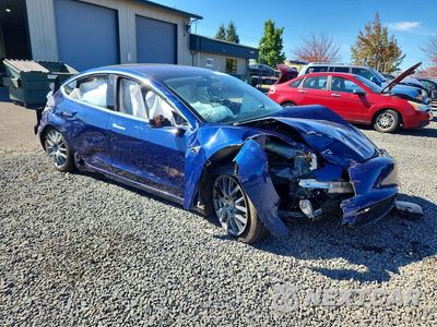 Czwarte zdjęcie samochodu z boku: 2018 TESLA MODEL 3 VIN:5YJ3E1EB7JF096470 - miniatura