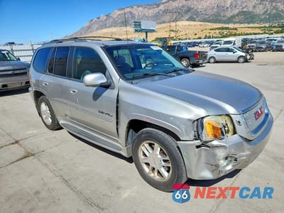 Czwarte zdjęcie samochodu z boku: 2006 GMC ENVOY DENALI VIN:1GKET63M262199844 - miniatura