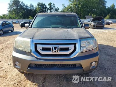 Piąte zdjęcie samochodu w środku: 2011 HONDA PILOT EXLN VIN:5FNYF3H75BB001315 - miniatura