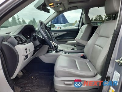 Zdjęcie 7 z 13 samochodu: 2020 HONDA PILOT EXL VIN:5FNYF6H5XLB058675 - miniatura