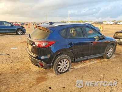 Trzecie zdjęcie samochodu z tyłu: 2014 MAZDA CX-5 TOURING VIN:JM3KE2CY0E0409525 - miniatura