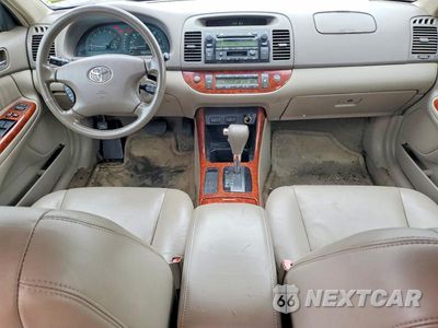 Zdjęcie 8 z 12 samochodu: 2003 TOYOTA CAMRY XLE VIN:4T1BE30K53U767638 - miniatura